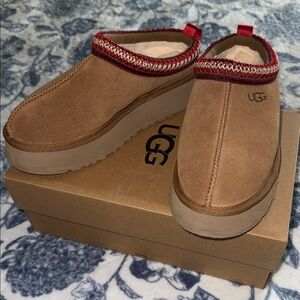 UGG Brown Suede Slip-Ons with Red Trim